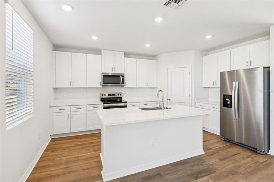 Furnished interior view inside a new home in Hilltop Vistas, Dade City (Image 5).