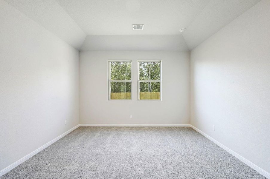 Primary Bedroom in the Willow home plan by Trophy Signature Homes – REPRESENTATIVE PHOTO