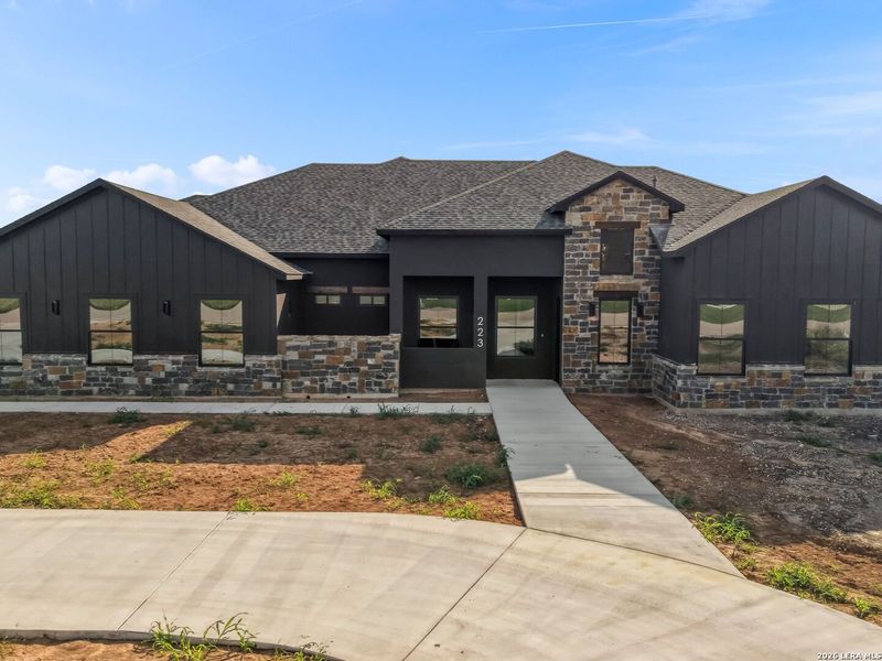 Front exterior of a new home in , Seguin, TX, highlighting curb appeal (Image 30). Front exterior of a new home in , Seguin, TX, highlighting curb appeal (Image 30).