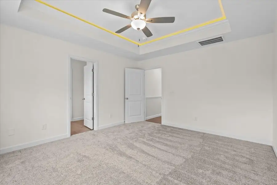Representative unfurnished interior of a home built from the Drayton by Enchanted Homes in Lonesome Dove, San Antonio (Image 13).
