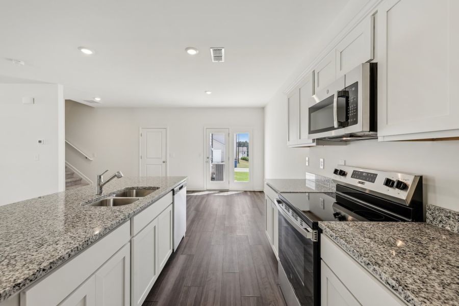 Representative furnished interior of a home built from the Neptune by Starlight Homes in Castlewood South, Taylor (Image 11). Representative furnished interior of a home built from the Neptune by Starlight Homes in Castlewood South, Taylor (Image 11).