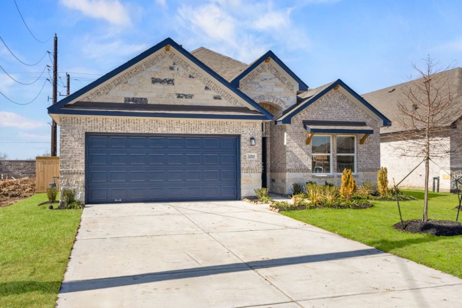 Front exterior of a new home in Ashland, Houston, TX, highlighting curb appeal (Image 19).
