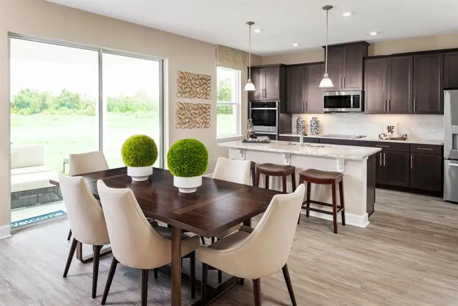 Representative furnished interior of a home built from the Rochelle by Ryan Homes in Bellaviva, Auburndale (Image 5).