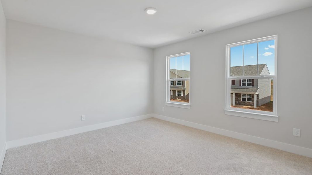 Representative furnished interior of a home built from the Stonefield - Finished Basement by DRB Homes in Pinebrook, Woodruff (Image 29).