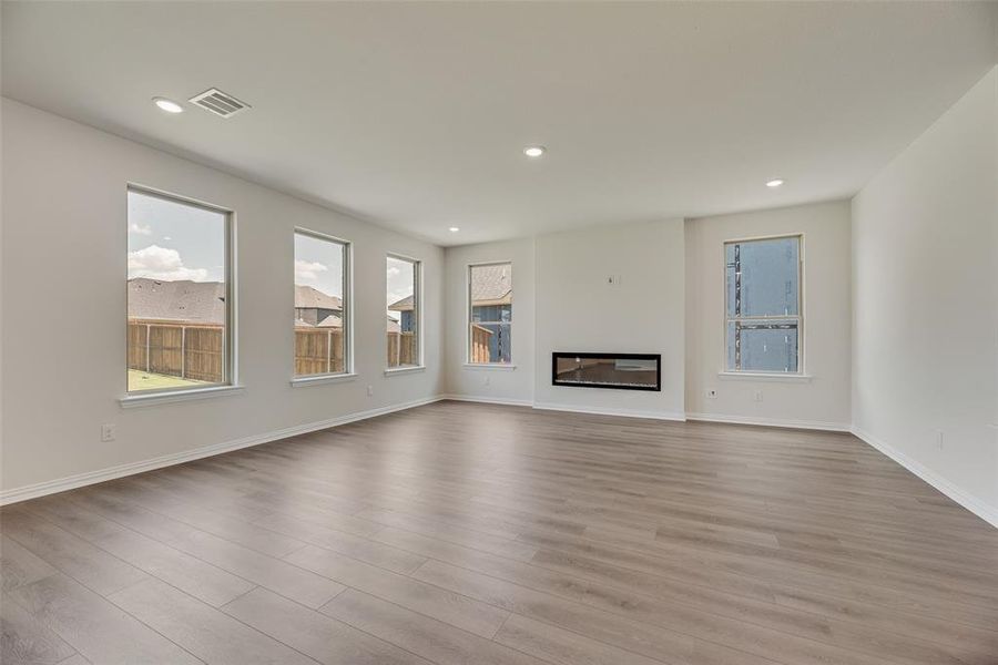 Spacious, unfurnished interior of a new home in Valencia On The Lake, Little Elm (Image 17).