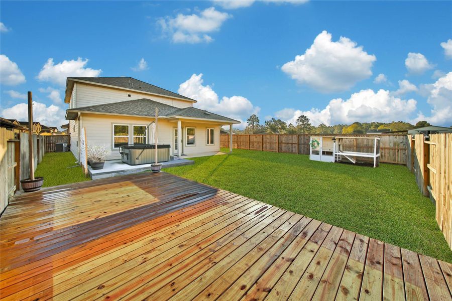 Exterior details and patio area of a home in Magnolia Place, Magnolia (Image 27).
