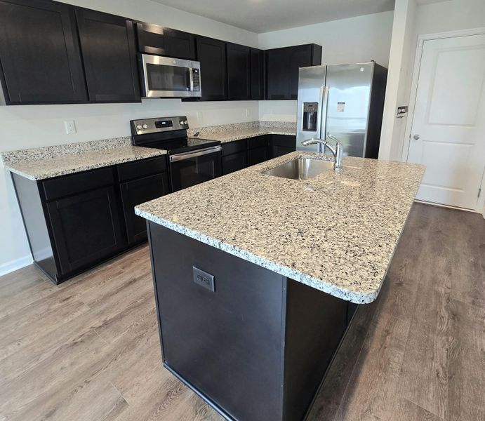 Furnished interior view inside a new home in , Greenville (Image 5).