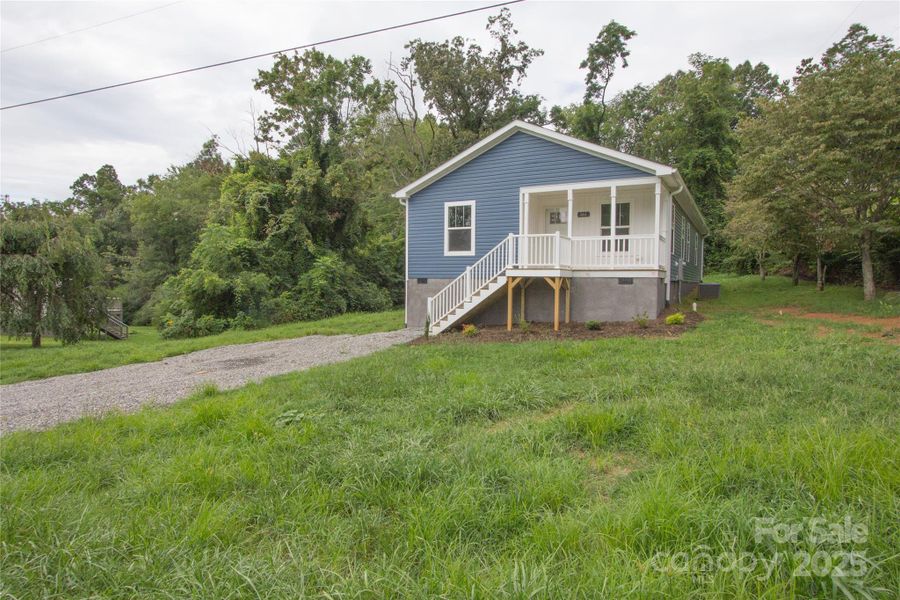 Front exterior of a new home in , Canton, NC, highlighting curb appeal (Image 13).