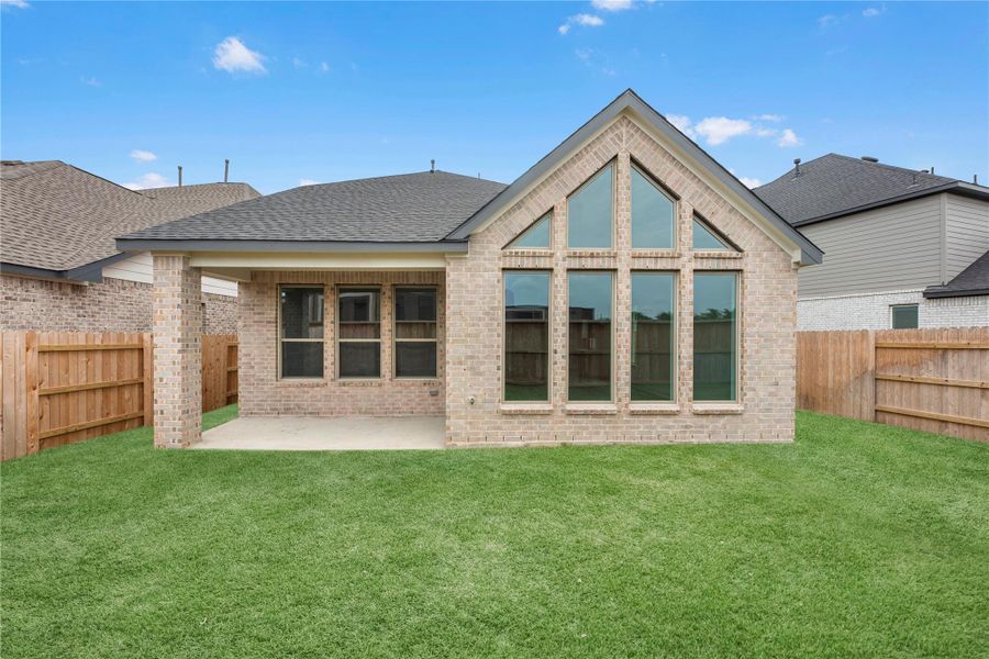 Exterior details and patio area of a home in Elyson - 40', Katy (Image 2). Exterior details and patio area of a home in Elyson - 40', Katy (Image 2).