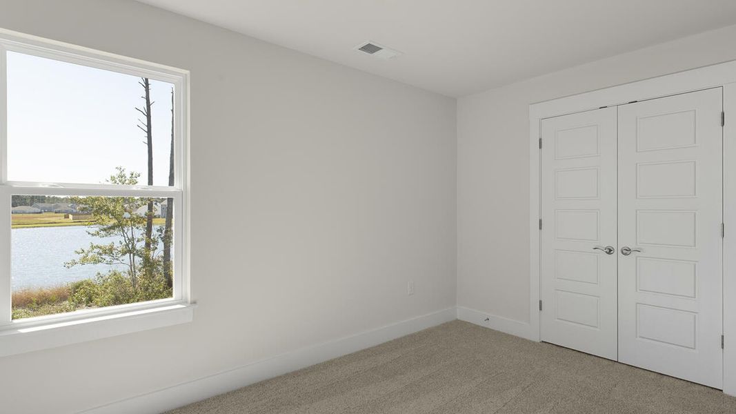 Representative unfurnished interior of a home built from the Wren by D.R. Horton in Sidbury Station, Castle Hayne (Image 40).