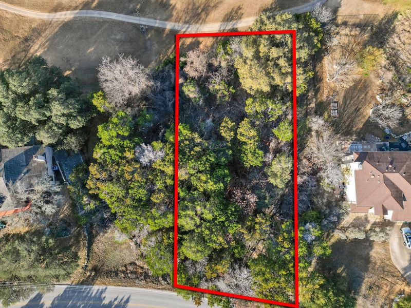 Aerial overview of property's location featuring approximate property parcel outlined