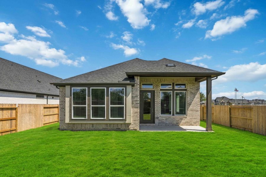 Exterior details and patio area of a home in Ellwood, Iowa Colony (Image 3). Exterior details and patio area of a home in Ellwood, Iowa Colony (Image 3).