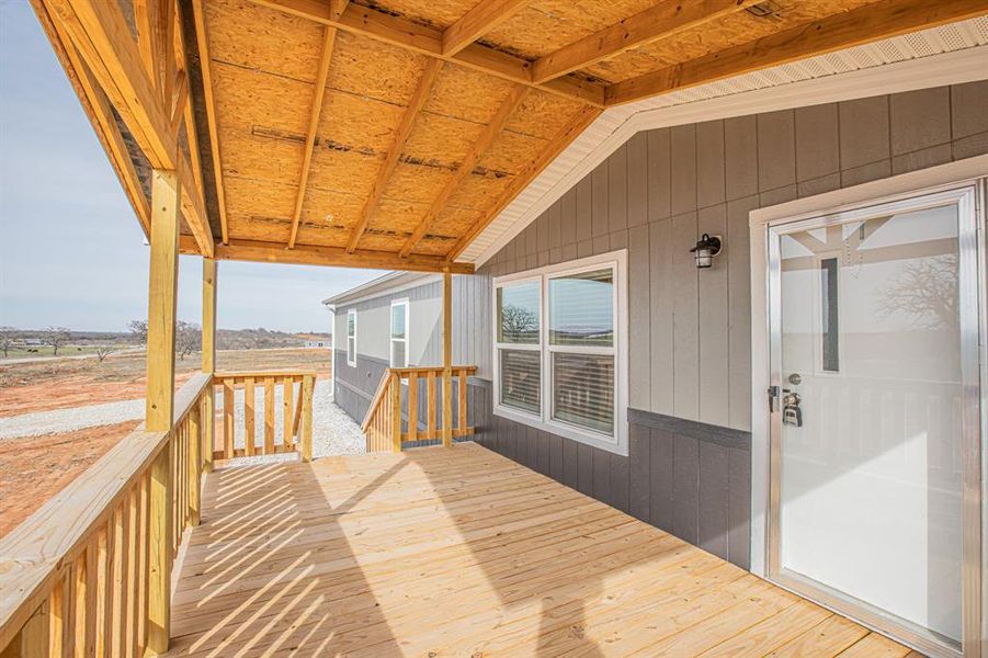 Exterior details and patio area of a home in , Poolville (Image 1).