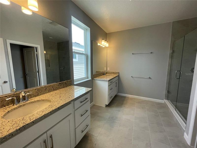 Furnished interior view inside a new home in Center Lake on the Park, St. Cloud (Image 18).
