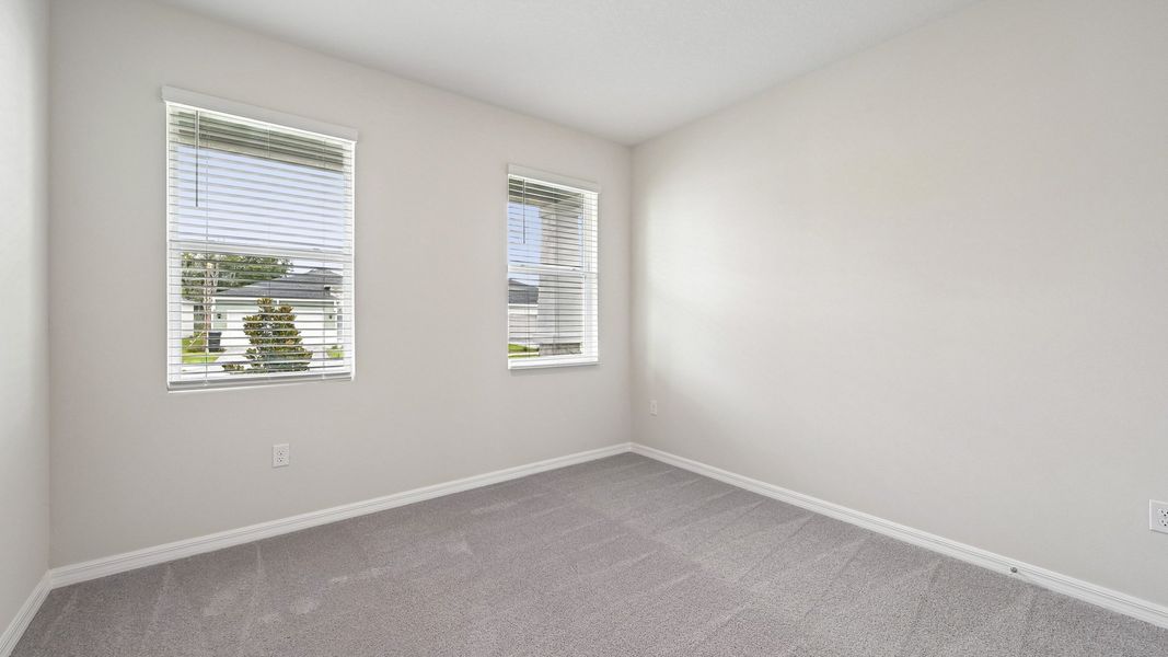 Representative unfurnished interior of a home built from the Laurel by D.R. Horton in Star Farms at Lakewood Ranch, Bradenton (Image 20).