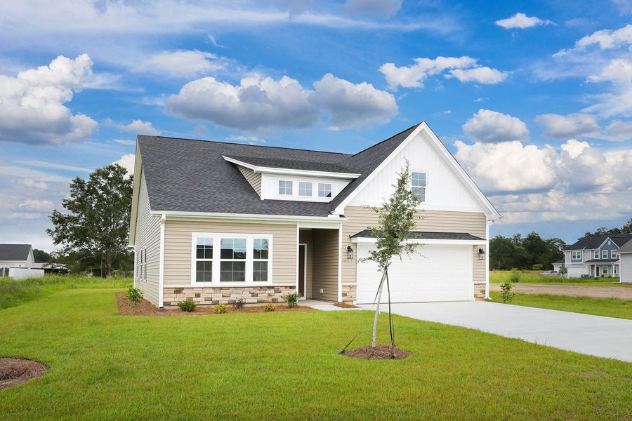 Front exterior of a new home in Garden Grove, Conway, SC, highlighting curb appeal (Image 2). Front exterior of a new home in Garden Grove, Conway, SC, highlighting curb appeal (Image 2).