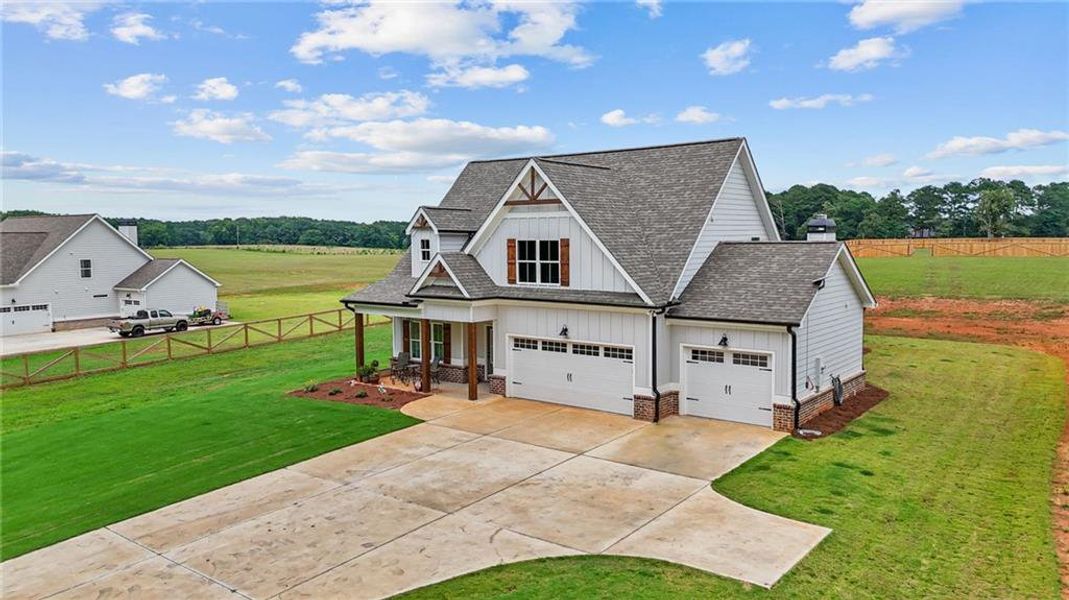 Front exterior of a new home in , Covington, GA, highlighting curb appeal (Image 32). Front exterior of a new home in , Covington, GA, highlighting curb appeal (Image 32).