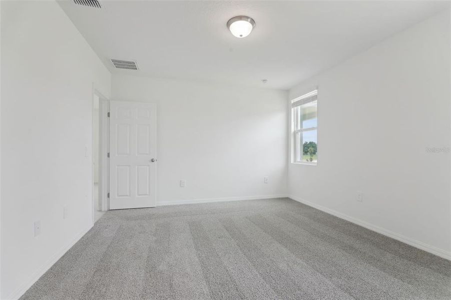 Spacious, unfurnished interior of a new home in Springs at Lake Alfred - Signature Series, Lake Alfred (Image 33).