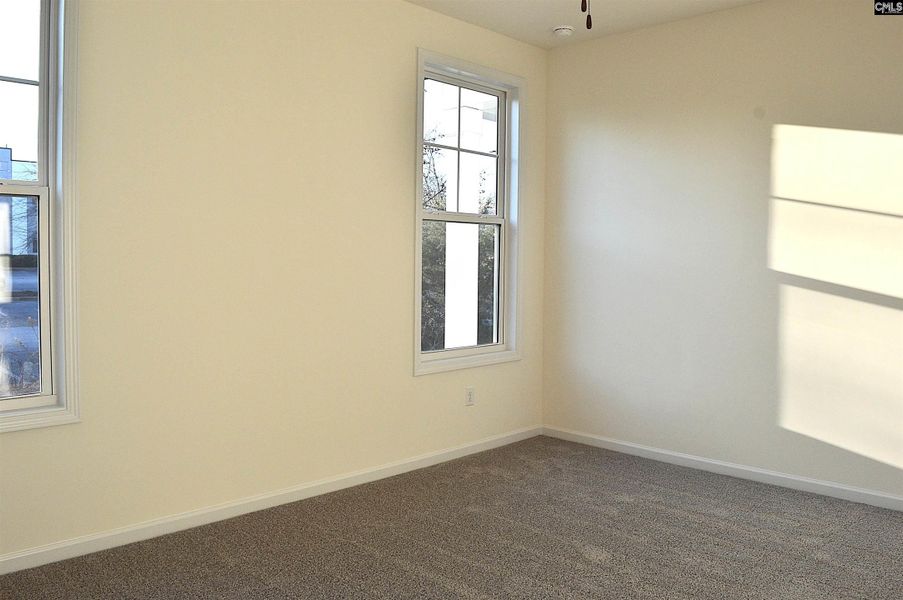 Spacious, unfurnished interior of a new home in Bickley Station, Irmo (Image 13).