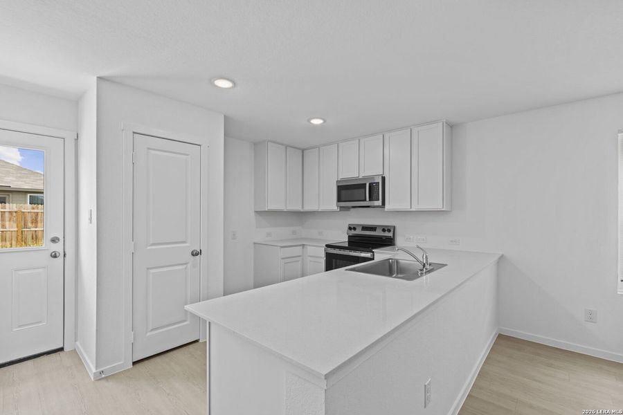 Furnished interior view inside a new home in Higdon Crossing, San Antonio (Image 9).