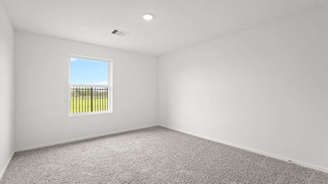 Spacious, unfurnished interior of a new home in Sunterra, Katy (Image 15).
