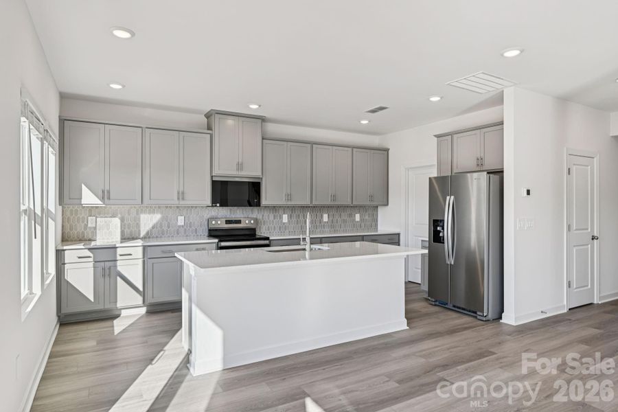 Photo is not of the actual home, but is an inspirational photo of builder’s model home and may depict options, furnishings, and/or decorator features that are not included