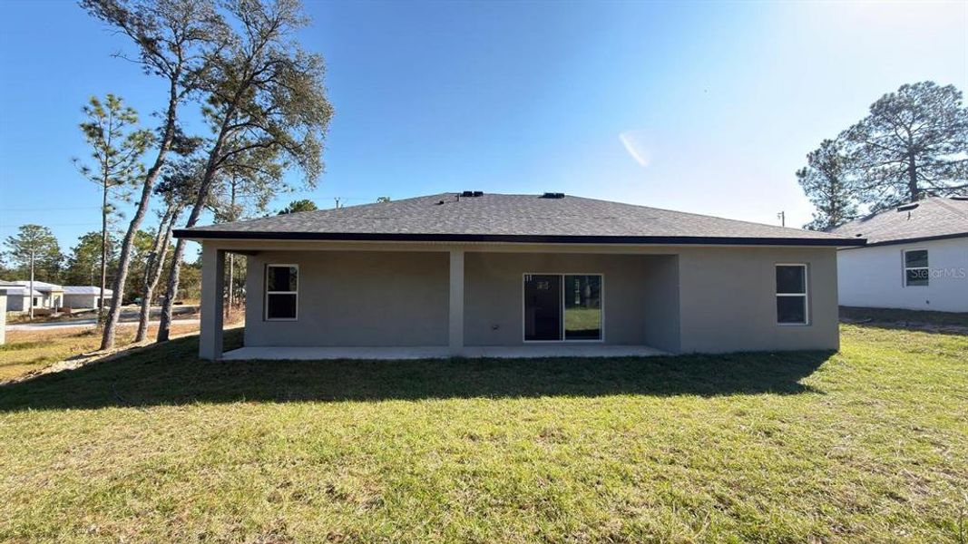 Front exterior of a new home in , Citrus Springs, FL, highlighting curb appeal (Image 20).