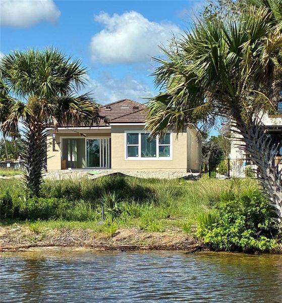 Exterior details and patio area of a home in , Flagler Beach (Image 4). Exterior details and patio area of a home in , Flagler Beach (Image 4).