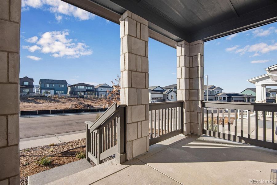 Exterior details and patio area of a home in Prelude at Sterling Ranch, Littleton (Image 31).