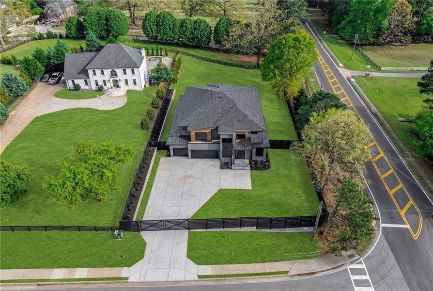 Front exterior of a new home in , Sugar Hill, GA, highlighting curb appeal (Image 28). Front exterior of a new home in , Sugar Hill, GA, highlighting curb appeal (Image 28).