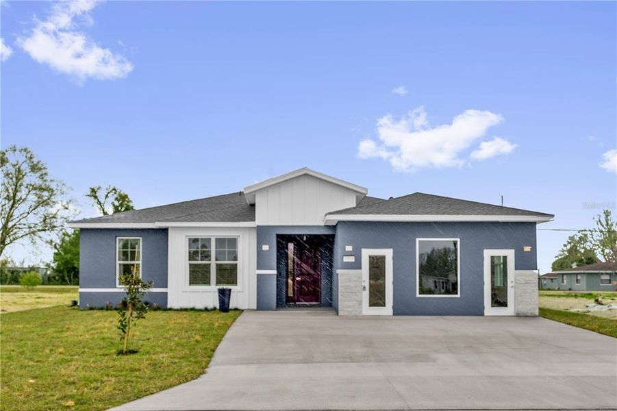 Front exterior of a new home in , Winter Haven, FL, highlighting curb appeal (Image 20).