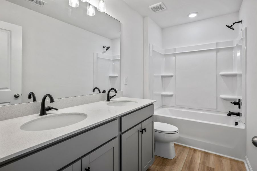 Furnished interior view inside a new home in Creekside at Andrews, Summerville (Image 11). Furnished interior view inside a new home in Creekside at Andrews, Summerville (Image 11).