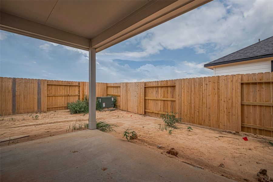 Exterior details and patio area of a home in , Brookshire (Image 30).