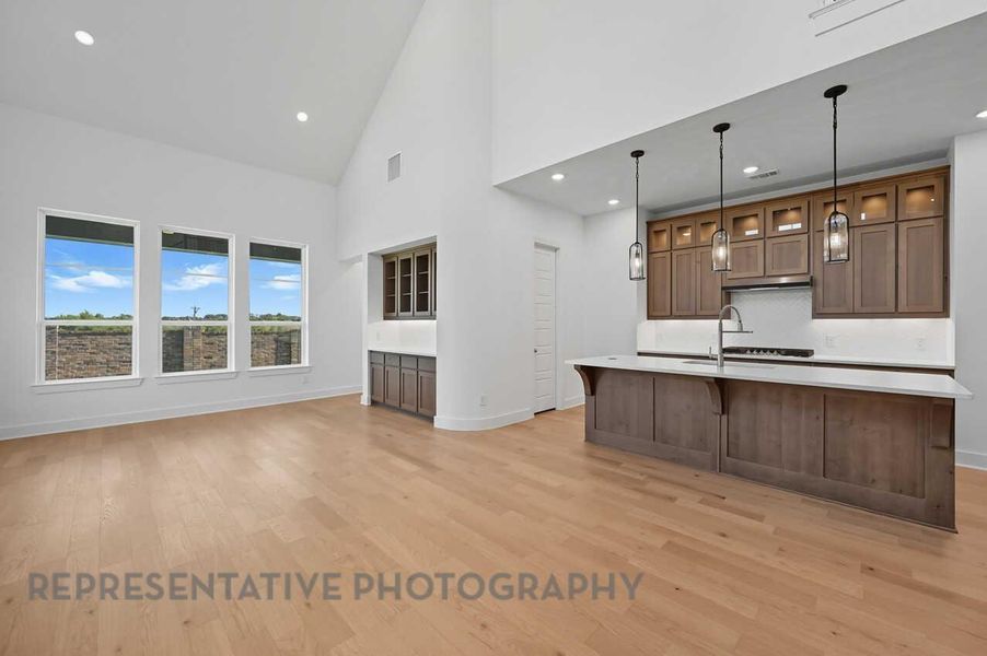 View of Kitchen, Family and Dining - Open Concept Living