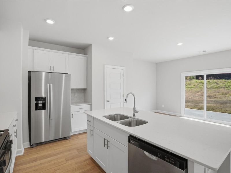 Furnished interior view inside a new home in Brayfield Manor - Heritage Collection, Wellford (Image 6).