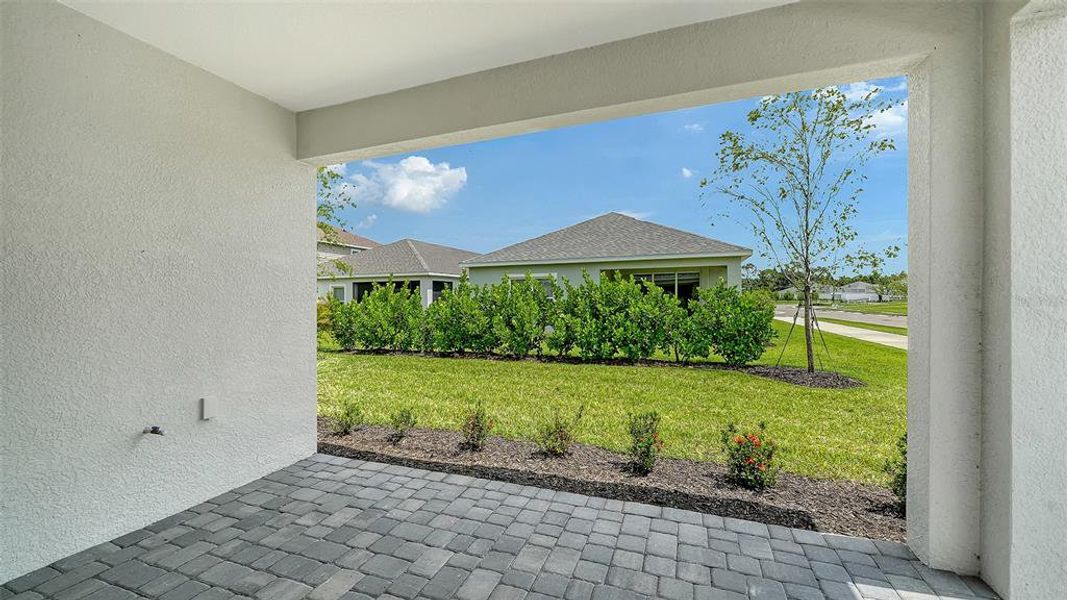Exterior details and patio area of a home in Wildleaf at North River Ranch, Parrish (Image 4).