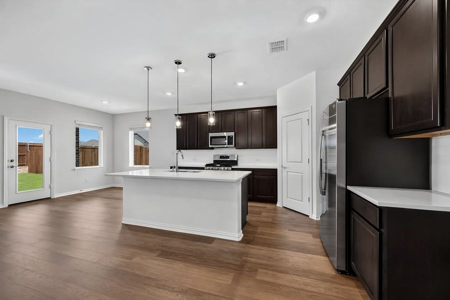 Furnished interior view inside a new home in Parks at Foster Crossing, Anna (Image 8).