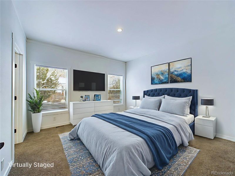 Primary bedroom featuring carpet