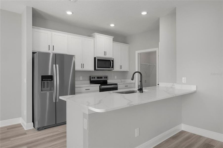 Furnished interior view inside a new home in Gum Lake Preserve, Lake Alfred (Image 8).