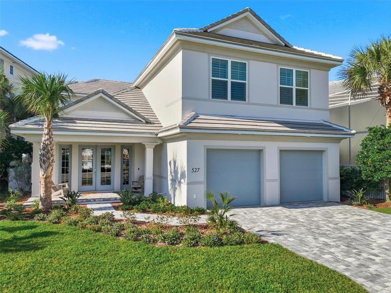 Front exterior of a new home in , Palm Coast, FL, highlighting curb appeal (Image 25). Front exterior of a new home in , Palm Coast, FL, highlighting curb appeal (Image 25).