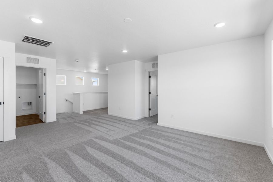 Representative unfurnished interior of a home built from the Bloom Series - Wallflower by Brightland Homes in Granary, Johnstown (Image 16). Representative unfurnished interior of a home built from the Bloom Series - Wallflower by Brightland Homes in Granary, Johnstown (Image 16).