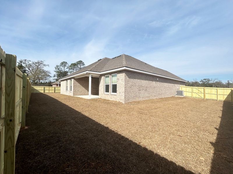 Exterior details and patio area of a home in Houston Place, Crestview (Image 4).