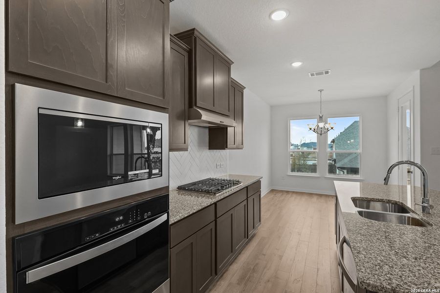 Furnished interior view inside a new home in Homestead, Schertz (Image 9).