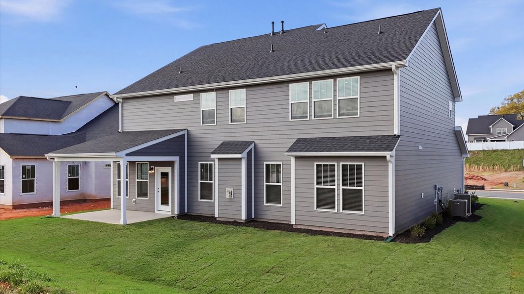 Exterior details and patio area of a home in Kayfield at Midway, Anderson (Image 21).