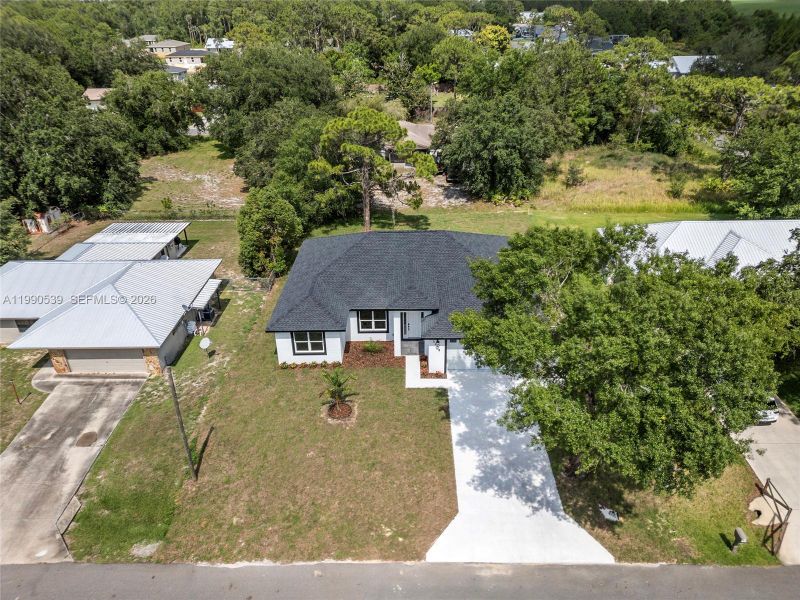 Front exterior of a new home in , Sebring, FL, highlighting curb appeal (Image 19). Front exterior of a new home in , Sebring, FL, highlighting curb appeal (Image 19).