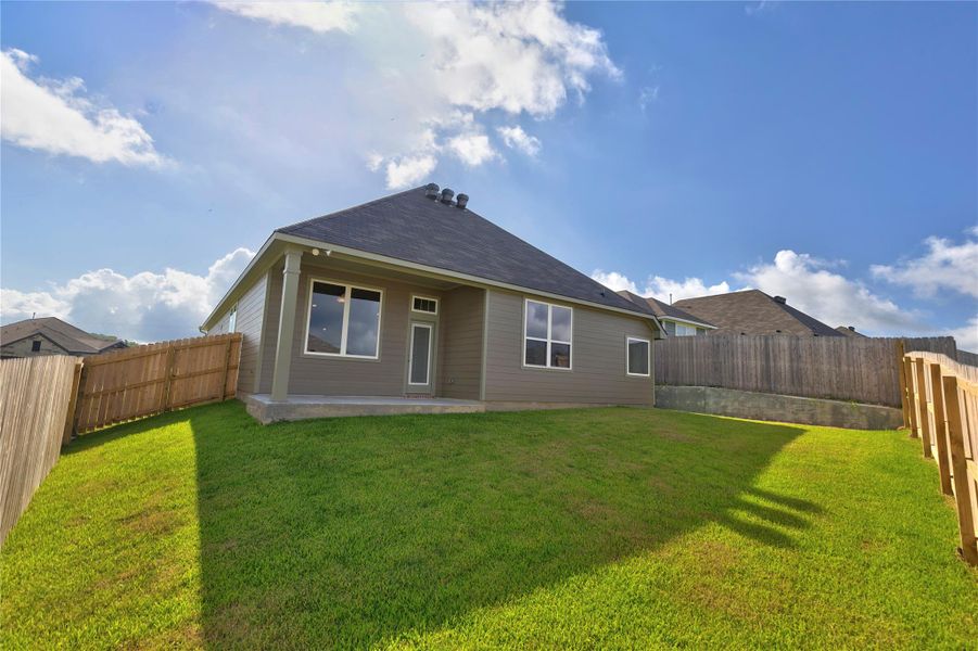 Exterior details and patio area of a home in Vintage Farms, Brenham (Image 3).