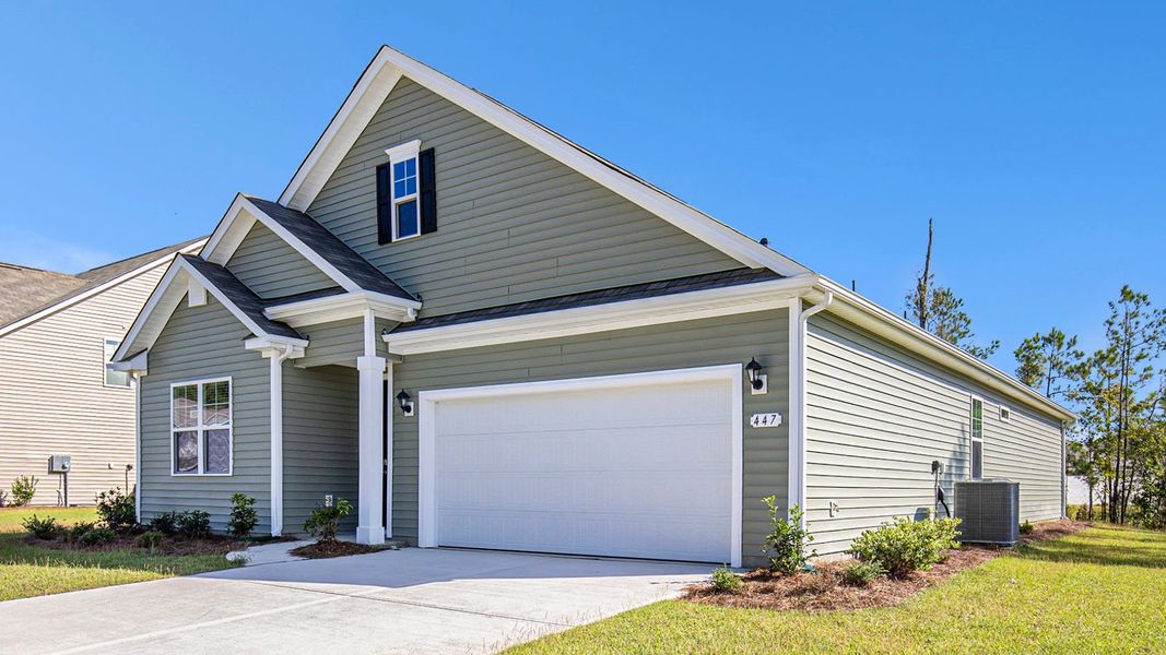 Front exterior of a new home in The Bluffs at Mill Creek, Florence, SC, highlighting curb appeal (Image 2). Front exterior of a new home in The Bluffs at Mill Creek, Florence, SC, highlighting curb appeal (Image 2).