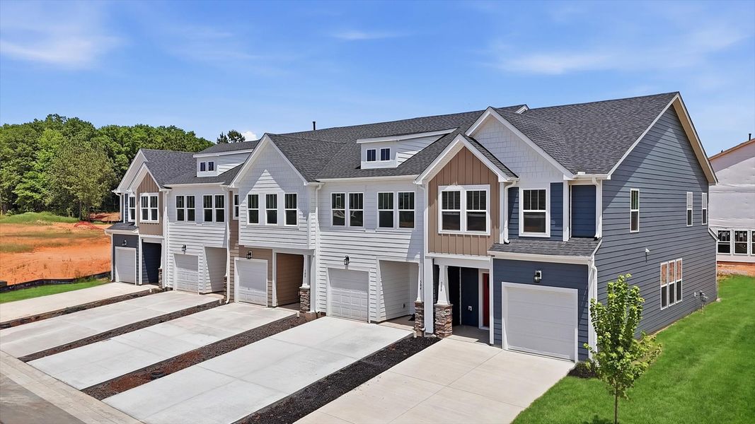 Front exterior of a new home in Barton Hollow, Fountain Inn, SC, highlighting curb appeal (Image 21). Front exterior of a new home in Barton Hollow, Fountain Inn, SC, highlighting curb appeal (Image 21).