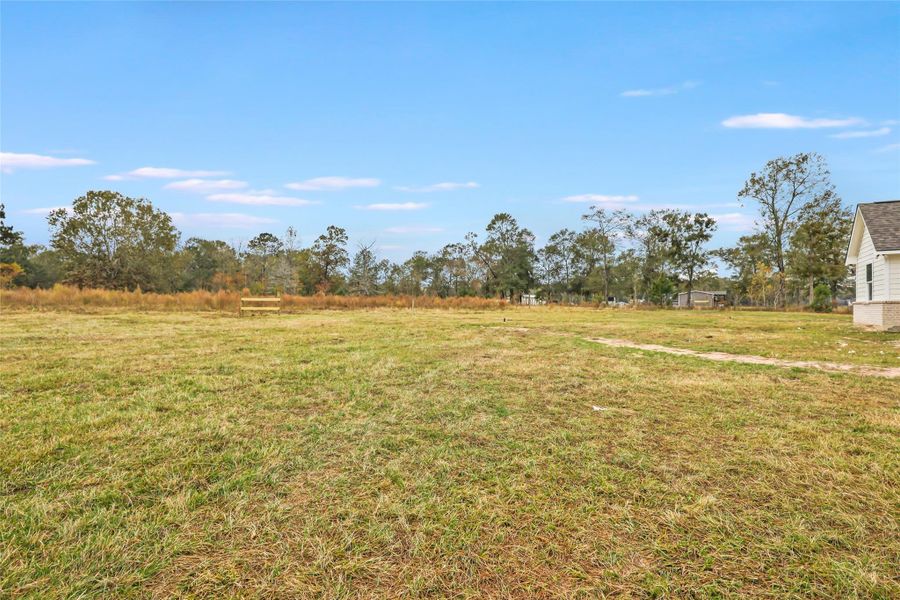 How about this for your back yard? Plenty of space for a pool AND a workshop and still place to play!