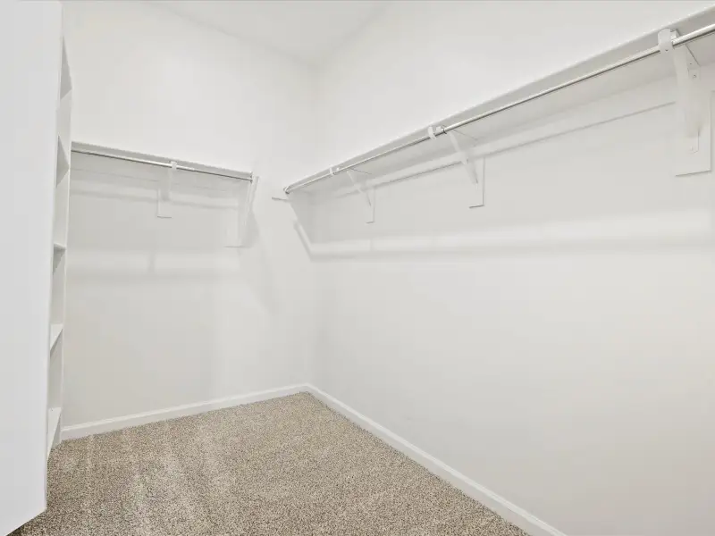 Spacious, unfurnished interior of a new home in Mandarina - Premier Series, Marana (Image 11). Spacious, unfurnished interior of a new home in Mandarina - Premier Series, Marana (Image 11).